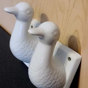 White ceramic duck towel holders